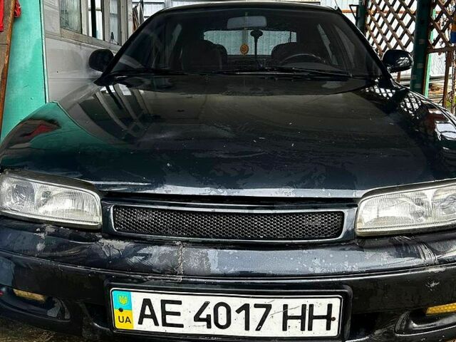 Черный Мазда 626, объемом двигателя 2 л и пробегом 0 тыс. км за 1500 $, фото 1 на Automoto.ua