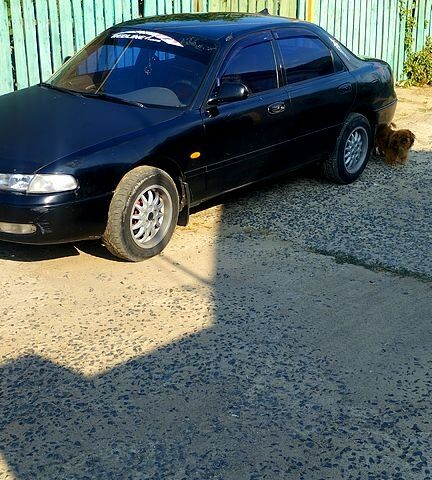 Черный Мазда 626, объемом двигателя 2 л и пробегом 0 тыс. км за 1900 $, фото 1 на Automoto.ua