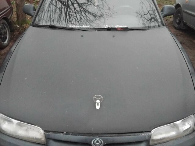 Черный Мазда 626, объемом двигателя 1.8 л и пробегом 1 тыс. км за 2500 $, фото 1 на Automoto.ua