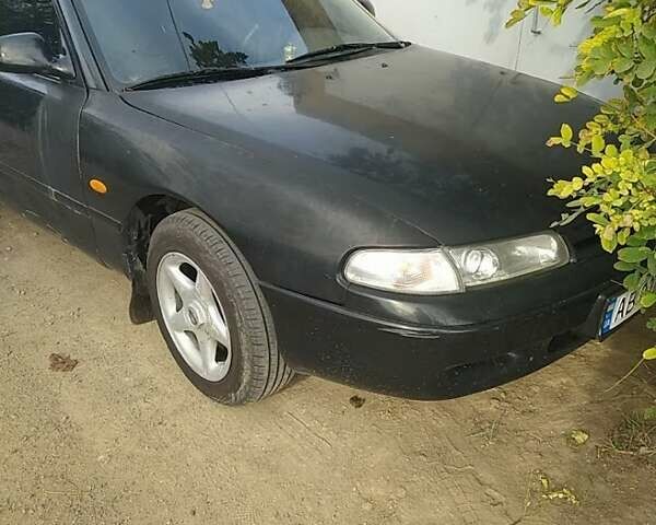 Чорний Мазда 626, об'ємом двигуна 2 л та пробігом 150 тис. км за 1500 $, фото 1 на Automoto.ua