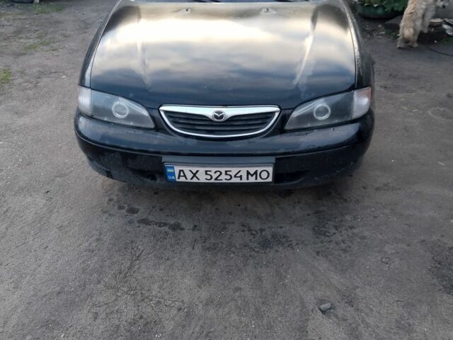 Чорний Мазда 626, об'ємом двигуна 2 л та пробігом 100 тис. км за 3000 $, фото 1 на Automoto.ua