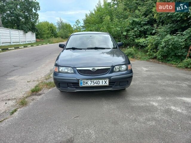 Черный Мазда 626, объемом двигателя 2 л и пробегом 253 тыс. км за 1800 $, фото 1 на Automoto.ua