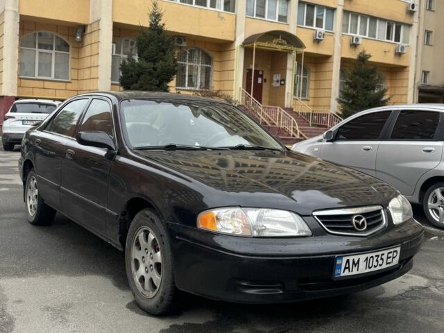 Черный Мазда 626, объемом двигателя 2 л и пробегом 259 тыс. км за 2200 $, фото 1 на Automoto.ua