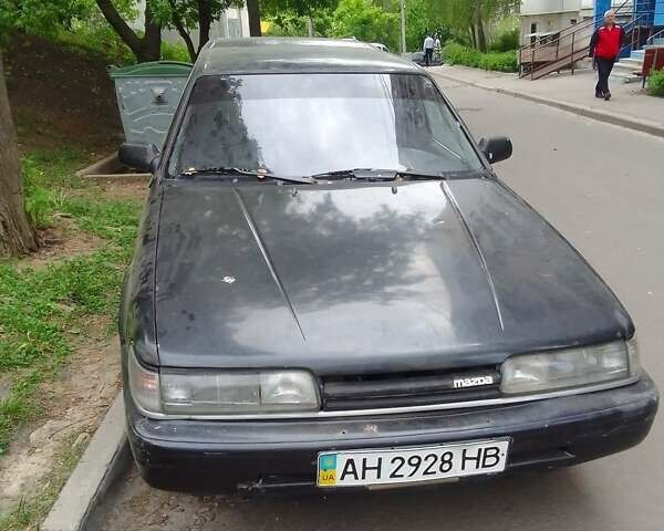 Чорний Мазда 626, об'ємом двигуна 2 л та пробігом 300 тис. км за 1300 $, фото 1 на Automoto.ua