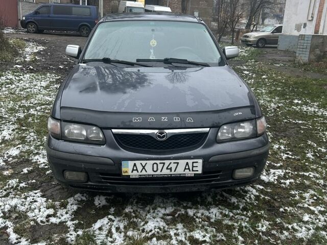 Фиолетовый Мазда 626, объемом двигателя 2 л и пробегом 340 тыс. км за 1900 $, фото 1 на Automoto.ua
