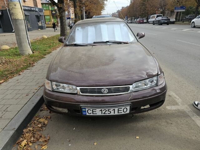 Коричневый Мазда 626, объемом двигателя 2 л и пробегом 290 тыс. км за 1150 $, фото 1 на Automoto.ua