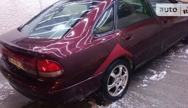 Коричневый Мазда 626, объемом двигателя 2 л и пробегом 260 тыс. км за 800 $, фото 1 на Automoto.ua