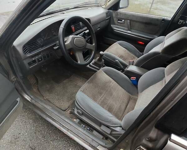 Коричневий Мазда 626, об'ємом двигуна 2 л та пробігом 245 тис. км за 700 $, фото 1 на Automoto.ua