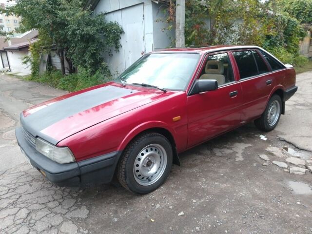 Червоний Мазда 626, об'ємом двигуна 2 л та пробігом 250 тис. км за 1399 $, фото 1 на Automoto.ua