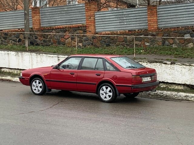 Красный Мазда 626, объемом двигателя 2 л и пробегом 1 тыс. км за 1900 $, фото 1 на Automoto.ua