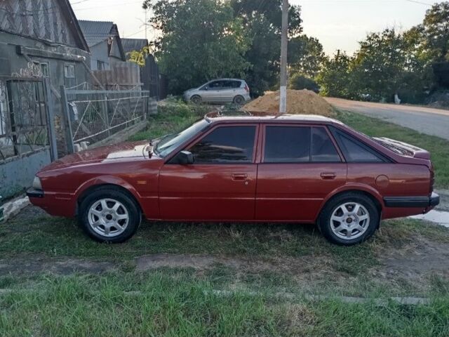 Червоний Мазда 626, об'ємом двигуна 2 л та пробігом 1000 тис. км за 1650 $, фото 1 на Automoto.ua
