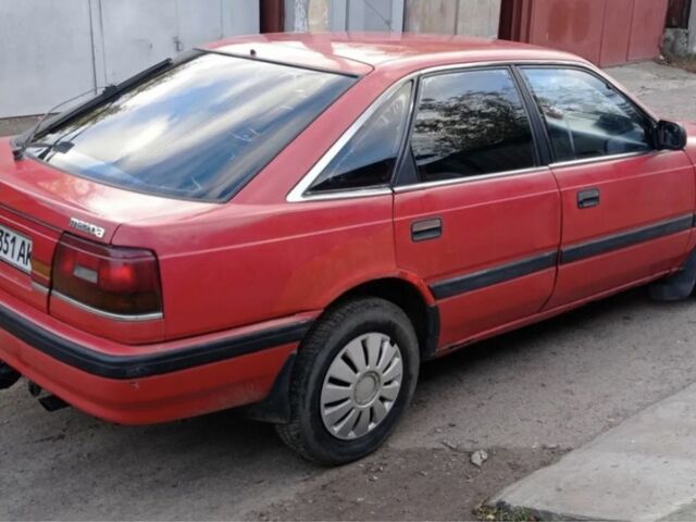 Красный Мазда 626, объемом двигателя 2 л и пробегом 373 тыс. км за 1350 $, фото 1 на Automoto.ua
