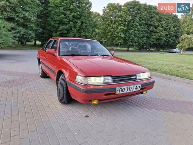 Красный Мазда 626, объемом двигателя 1.8 л и пробегом 480 тыс. км за 1600 $, фото 1 на Automoto.ua