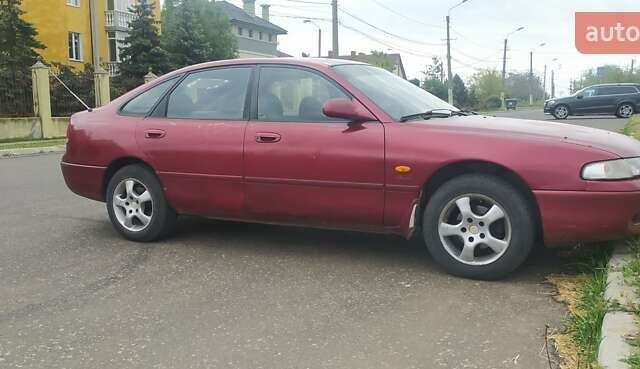 Красный Мазда 626, объемом двигателя 2 л и пробегом 352 тыс. км за 1400 $, фото 1 на Automoto.ua