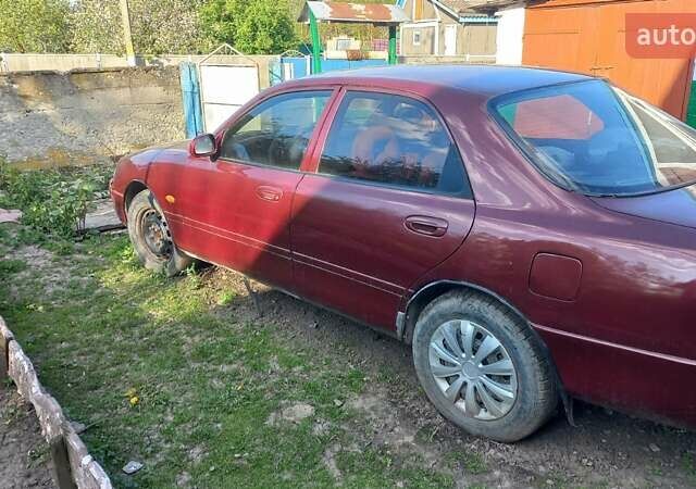 Красный Мазда 626, объемом двигателя 2 л и пробегом 418 тыс. км за 1650 $, фото 1 на Automoto.ua