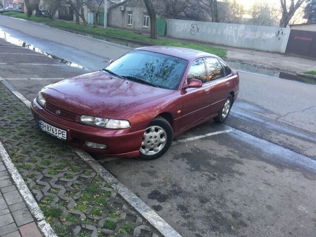 Красный Мазда 626, объемом двигателя 2.5 л и пробегом 270 тыс. км за 3500 $, фото 1 на Automoto.ua