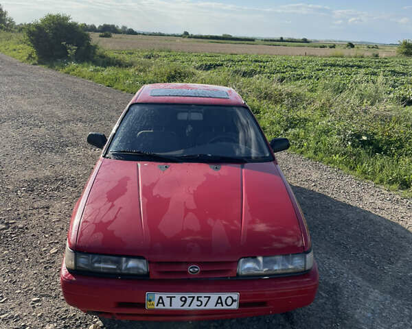 Червоний Мазда 626, об'ємом двигуна 2 л та пробігом 311 тис. км за 1100 $, фото 1 на Automoto.ua