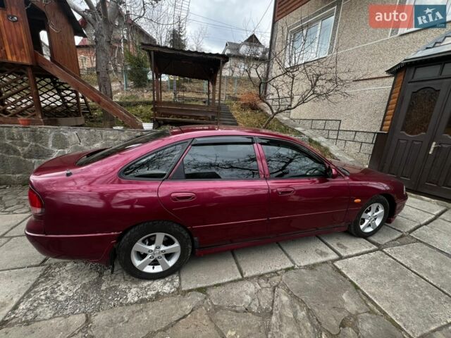 Червоний Мазда 626, об'ємом двигуна 2.5 л та пробігом 295 тис. км за 3000 $, фото 1 на Automoto.ua