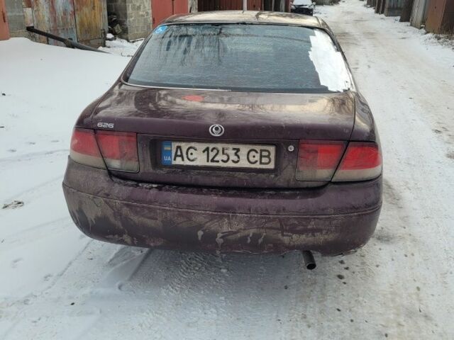 Красный Мазда 626, объемом двигателя 2 л и пробегом 50 тыс. км за 473 $, фото 1 на Automoto.ua