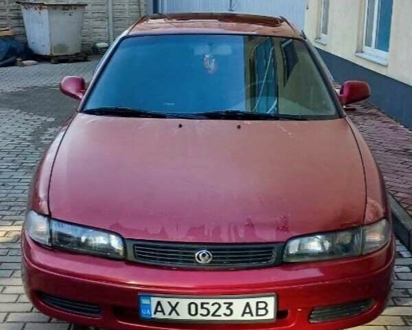 Красный Мазда 626, объемом двигателя 1.8 л и пробегом 257 тыс. км за 1200 $, фото 1 на Automoto.ua