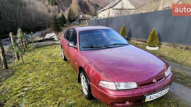 Красный Мазда 626, объемом двигателя 1.8 л и пробегом 219 тыс. км за 1700 $, фото 1 на Automoto.ua