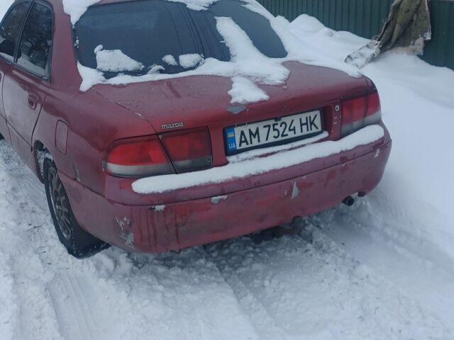 Красный Мазда 626, объемом двигателя 2 л и пробегом 120 тыс. км за 700 $, фото 1 на Automoto.ua