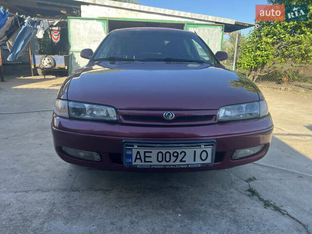 Красный Мазда 626, объемом двигателя 2 л и пробегом 284 тыс. км за 3200 $, фото 1 на Automoto.ua