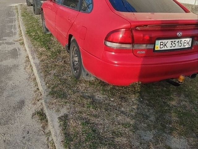 Червоний Мазда 626, об'ємом двигуна 2 л та пробігом 300 тис. км за 1400 $, фото 1 на Automoto.ua