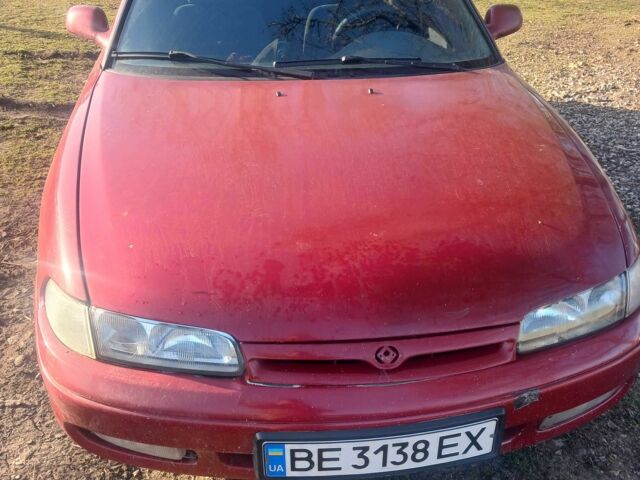 Красный Мазда 626, объемом двигателя 2.5 л и пробегом 250 тыс. км за 1806 $, фото 1 на Automoto.ua