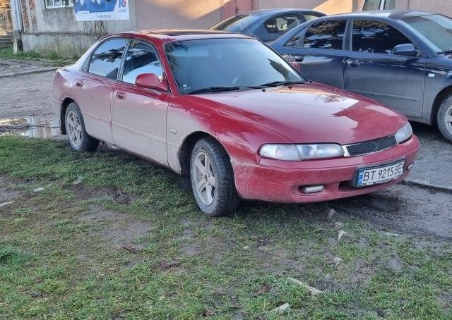 Червоний Мазда 626, об'ємом двигуна 2 л та пробігом 999 тис. км за 2000 $, фото 1 на Automoto.ua