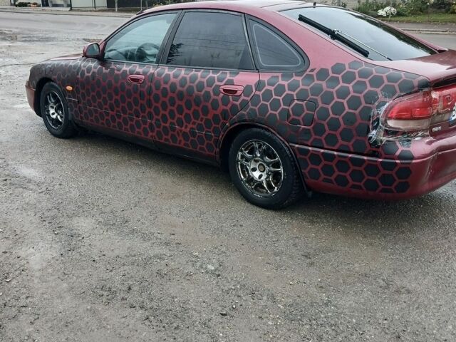 Червоний Мазда 626, об'ємом двигуна 2 л та пробігом 430 тис. км за 899 $, фото 1 на Automoto.ua