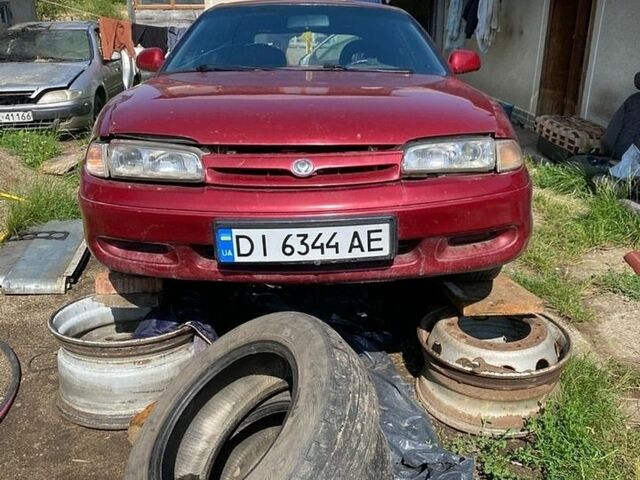 Красный Мазда 626, объемом двигателя 2 л и пробегом 7 тыс. км за 700 $, фото 1 на Automoto.ua
