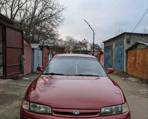 Красный Мазда 626, объемом двигателя 2 л и пробегом 409 тыс. км за 1800 $, фото 1 на Automoto.ua