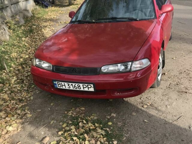 Красный Мазда 626, объемом двигателя 1.8 л и пробегом 100 тыс. км за 1600 $, фото 1 на Automoto.ua