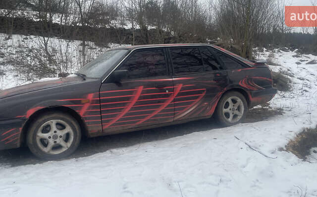 Красный Мазда 626, объемом двигателя 2 л и пробегом 455 тыс. км за 850 $, фото 1 на Automoto.ua