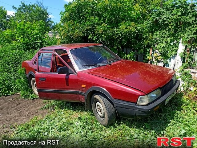 Красный Мазда 626, объемом двигателя 2 л и пробегом 300 тыс. км за 500 $, фото 1 на Automoto.ua