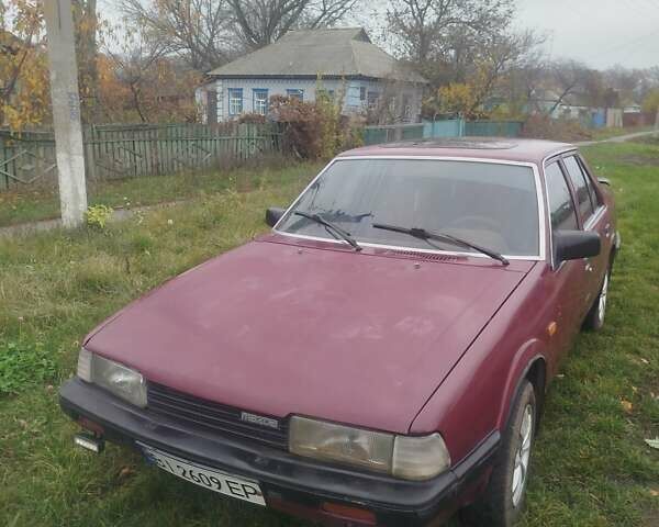 Красный Мазда 626, объемом двигателя 2 л и пробегом 300 тыс. км за 1000 $, фото 1 на Automoto.ua