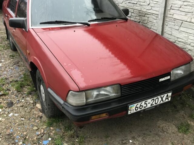 Красный Мазда 626, объемом двигателя 2 л и пробегом 999 тыс. км за 700 $, фото 1 на Automoto.ua