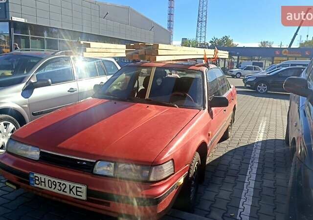 Красный Мазда 626, объемом двигателя 2 л и пробегом 325 тыс. км за 1500 $, фото 1 на Automoto.ua