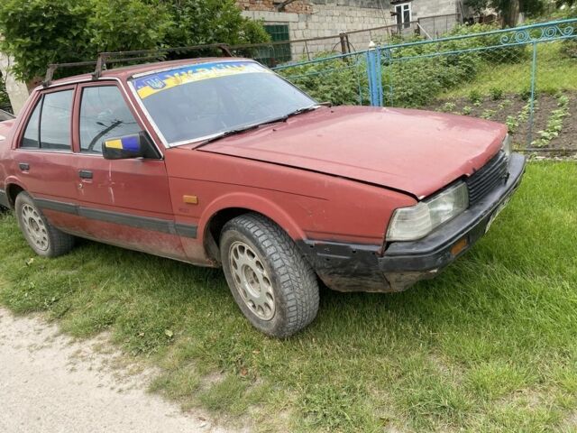 Красный Мазда 626, объемом двигателя 2 л и пробегом 50 тыс. км за 852 $, фото 1 на Automoto.ua