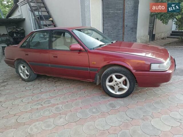 Красный Мазда 626, объемом двигателя 1.8 л и пробегом 111 тыс. км за 800 $, фото 1 на Automoto.ua