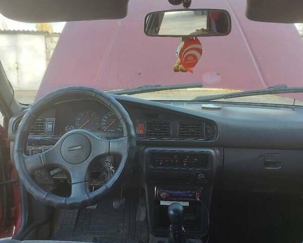 Красный Мазда 626, объемом двигателя 2.18 л и пробегом 200 тыс. км за 1500 $, фото 1 на Automoto.ua