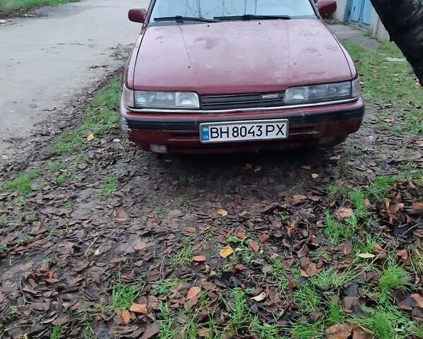 Красный Мазда 626, объемом двигателя 2 л и пробегом 225 тыс. км за 550 $, фото 1 на Automoto.ua