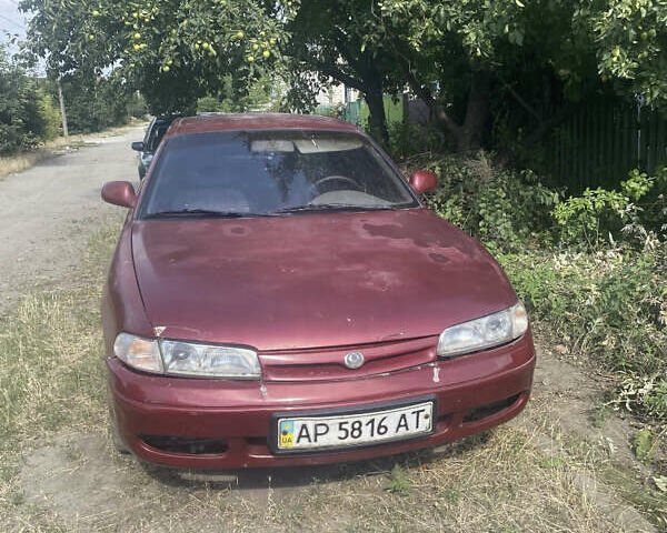 Червоний Мазда 626, об'ємом двигуна 2 л та пробігом 258 тис. км за 960 $, фото 1 на Automoto.ua