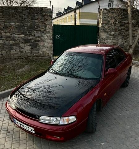 Красный Мазда 626, объемом двигателя 2 л и пробегом 305 тыс. км за 2399 $, фото 1 на Automoto.ua