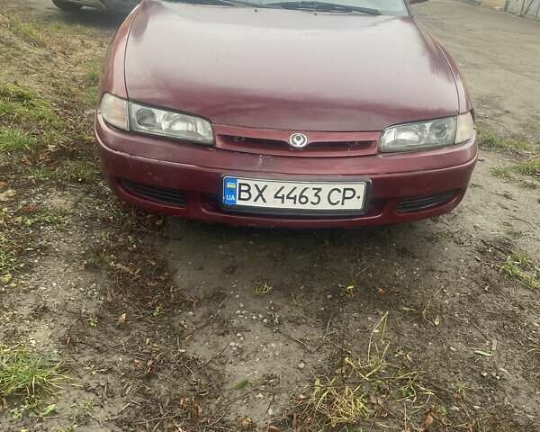 Красный Мазда 626, объемом двигателя 2 л и пробегом 300 тыс. км за 1350 $, фото 1 на Automoto.ua