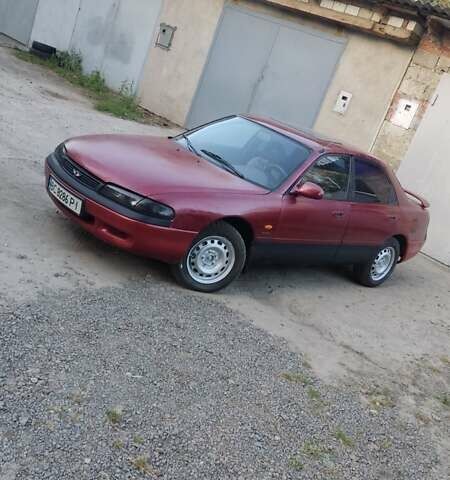 Червоний Мазда 626, об'ємом двигуна 1.84 л та пробігом 374 тис. км за 1796 $, фото 1 на Automoto.ua