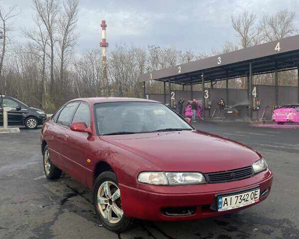 Красный Мазда 626, объемом двигателя 2 л и пробегом 320 тыс. км за 1549 $, фото 1 на Automoto.ua