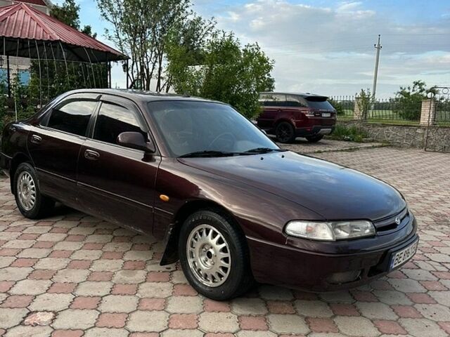 Красный Мазда 626, объемом двигателя 2 л и пробегом 300 тыс. км за 1850 $, фото 1 на Automoto.ua