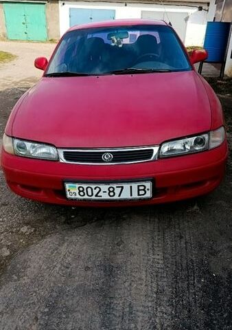 Красный Мазда 626, объемом двигателя 2 л и пробегом 330 тыс. км за 998 $, фото 1 на Automoto.ua